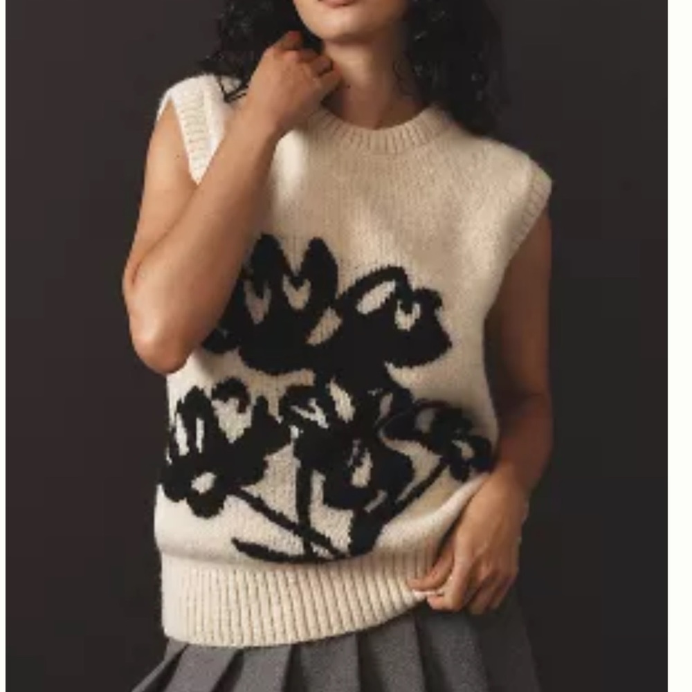 Sleeveless Cream Sweater with Black Floral Design